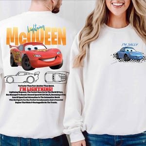 a man and a woman wearing matching sweatshirts