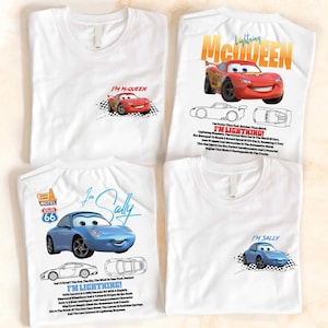 three t - shirts with cars on them on a table