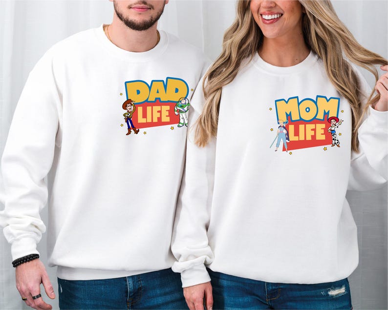 a man and a woman wearing matching sweatshirts