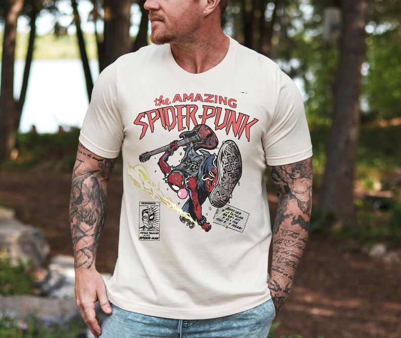 a man with a tattoo on his arm holding a frisbee