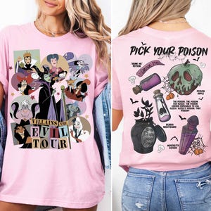 a woman wearing a pink shirt with cartoon characters on it
