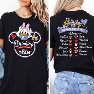a woman wearing a mickey mouse t - shirt
