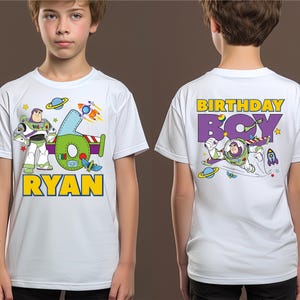 a young boy wearing a birthday boy shirt