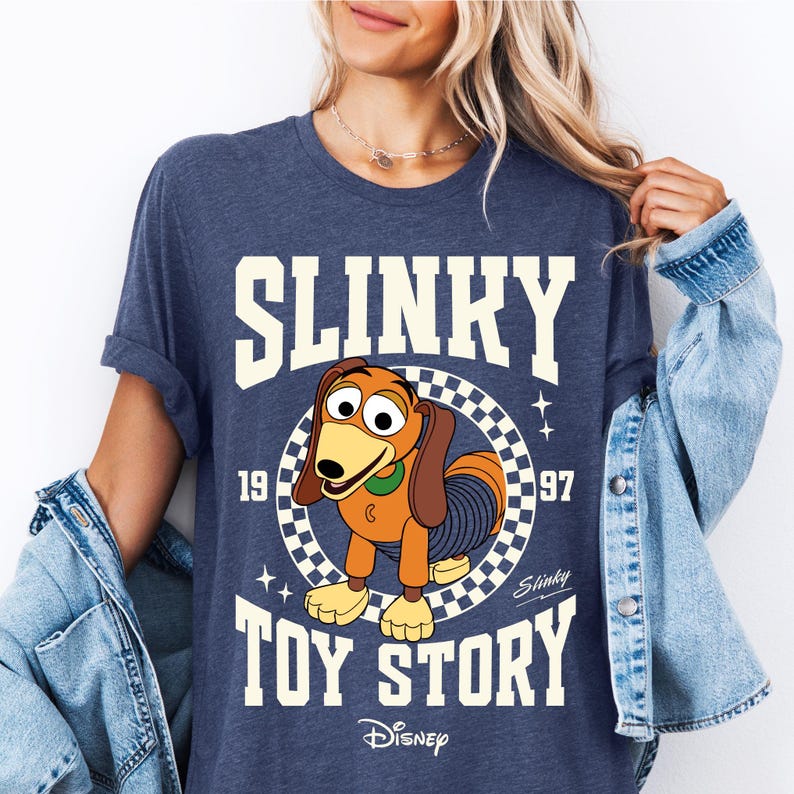 a woman wearing a shirt that says slinky is a toy story