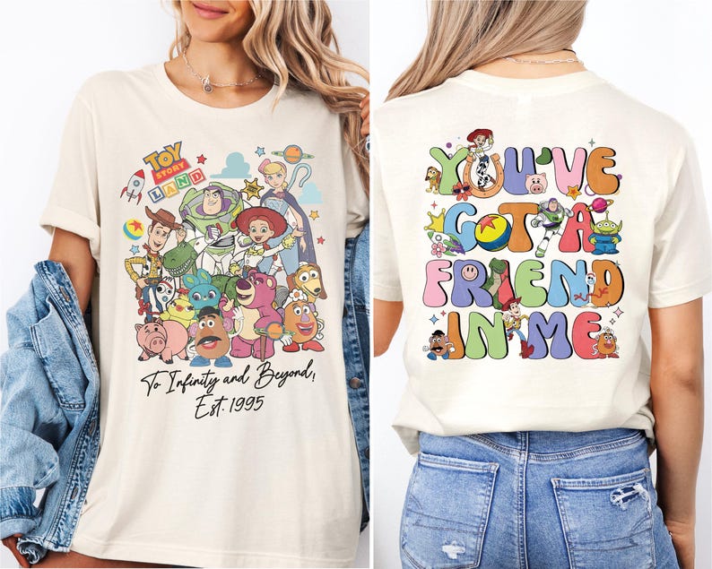 a woman wearing a white tshirt with cartoon characters on it