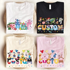 four t-shirts with different Disney character designs and the word "CUSTOM" printed on them.