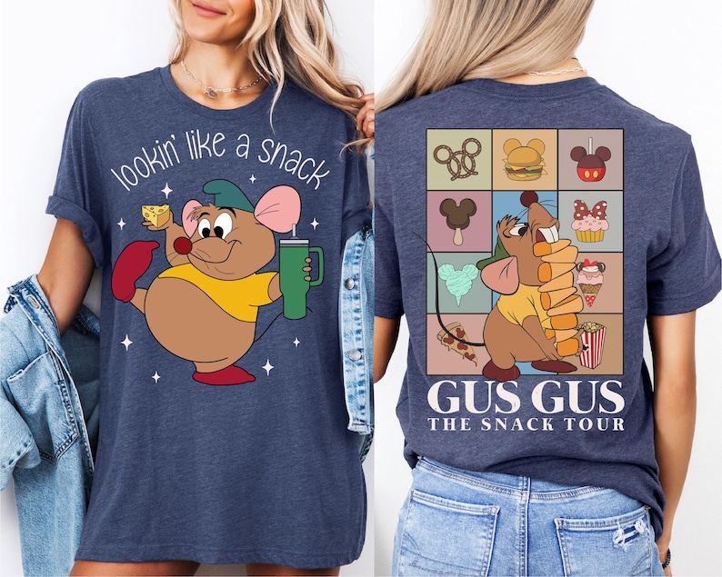 a woman wearing a t - shirt with a cartoon character on it