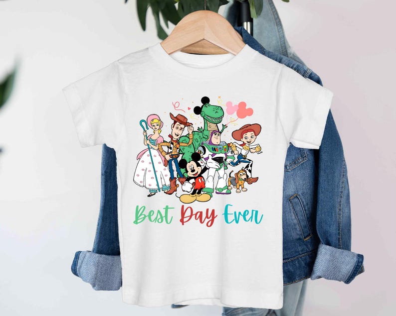 a white t - shirt with cartoon characters on it