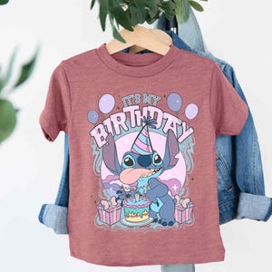 a t - shirt that says it's my birthday on it