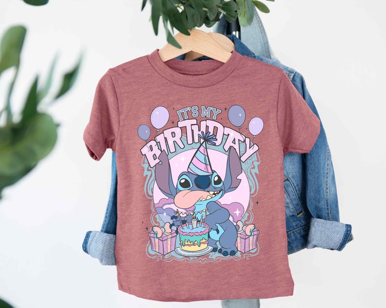 a t - shirt that says it's my birthday on it