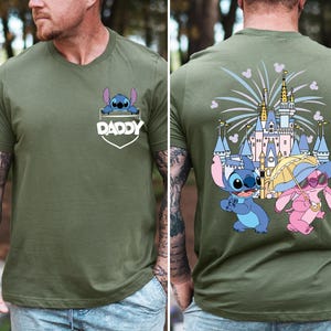 a man in a green shirt has tattoos on his arm