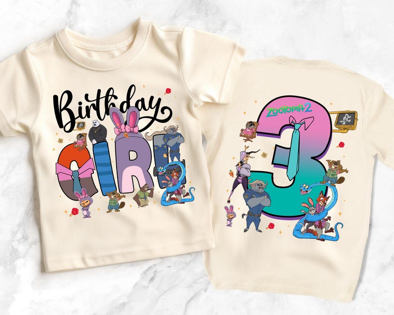 A white t-shirt with a birthday theme featuring cartoon characters and the text "Birthday Girl 3".