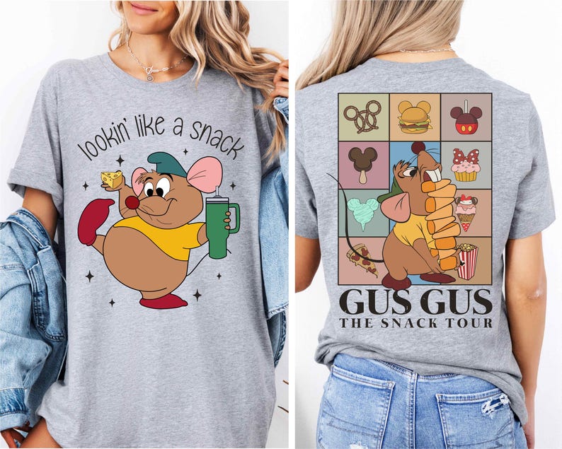 a woman wearing a t - shirt with a cartoon character on it