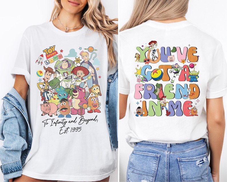 a woman wearing a white tshirt with cartoon characters on it