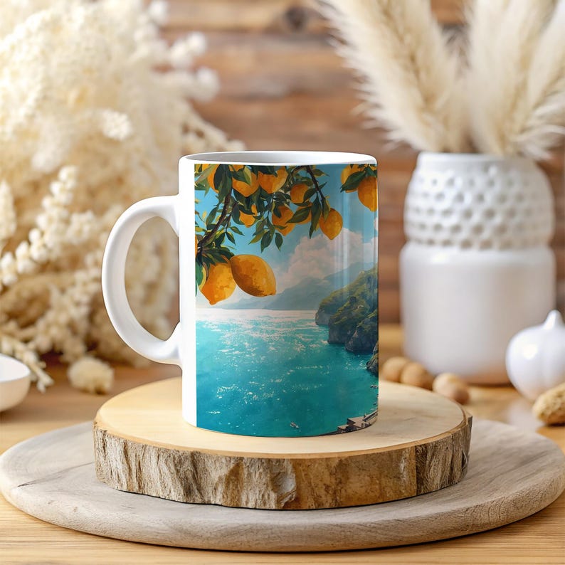 Amalfi Coast mug with lemon design placed on wooden coaster beside flowers and cozy decor