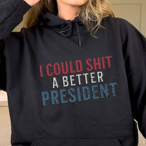 Ich könnte Shirt ein besserer Präsident Hoodie,Anti Trump Hoodie,Fuck Trump Shirt, ich habe nicht für ihn gestimmt,feministische Shirt,Trump Sucks Shirt,Anti Maga