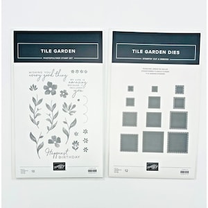 May include: Two white rectangular packages featuring Stampin' Up! branding. The left package is a Tile Garden photopolymer stamp set with floral and leaf designs and text. The right package is a Tile Garden dies set with various square shapes.