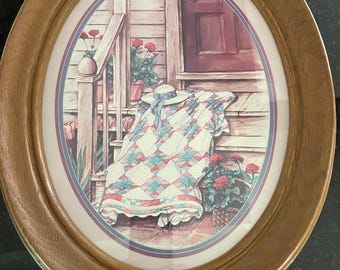 Vtg. 1980's Homco Country Cottage Porch Framed Print Quilt and Hat Scene in Oval Frame.