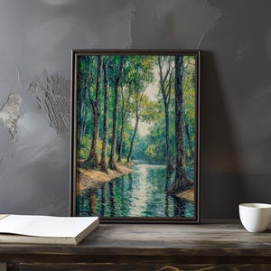 May include: A framed painting of a forest scene with a river running through it. The trees are green and the water is blue. The painting is in a dark brown frame.