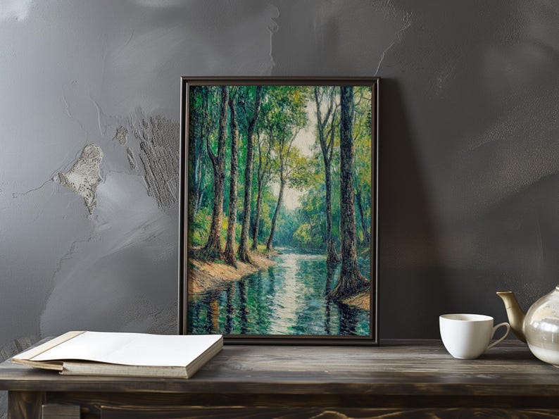 May include: A framed painting of a forest scene with a river running through it. The trees are green and the water is blue. The painting is in a dark brown frame.