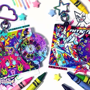 Stomach Book & Femtanyl CD Keychains