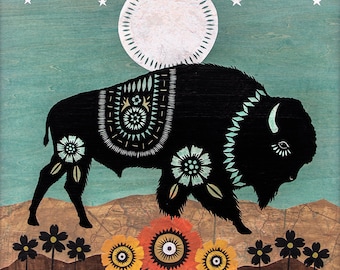 May include: A black silhouette of a bison with intricate floral patterns on its body stands in a field of flowers under a crescent moon and a cloudy sky.