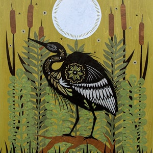 May include: A black and white stylized illustration of a heron standing on a branch in a swamp. The heron has intricate details and is surrounded by green reeds and a full moon.