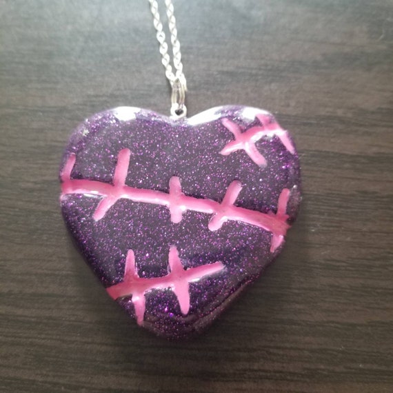 Monster heart necklace discount