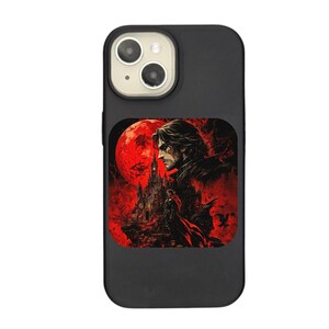 May include: Black iPhone case with a red and black illustration of a man with a castle in the background. The illustration is of a character from the video game Castlevania.