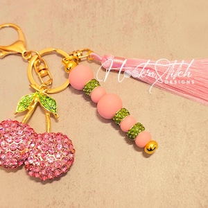 Accesorio para bolso de mano con forma de racimo de cerezas en flor