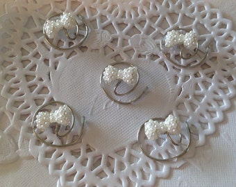 Flower girls hair swirls, pearl bows hair spins, twists, coils, spirals, spin pins, brides, bridesmaids