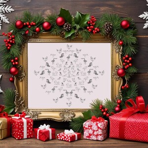May include: A gold-framed picture with a white background and a gray snowflake design. The picture is surrounded by a garland of green pine branches, red berries, and red ornaments. There are also white snowflakes and stars hanging from the wall behind the picture.  There are six red and white wrapped gifts in front of the picture.