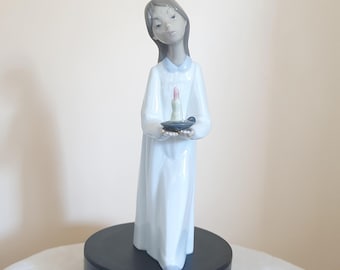 Lladro 4868 Young Girl with candle porcelain figurine.