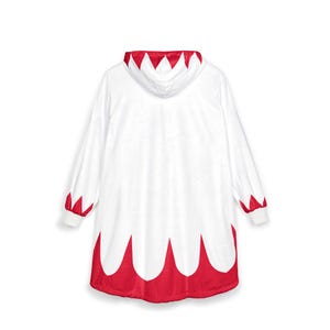 May include: A white hooded sweatshirt featuring a red jagged pattern along the hem, the sleeve cuffs, and the edge of the hood. The garment has long sleeves and a loose, oversized fit, with the red design creating a distinct contrast against the white.