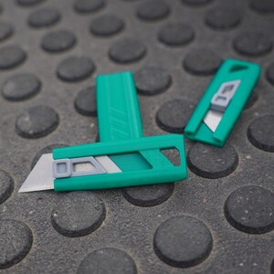 Midnight Draft Utility Knife Teal