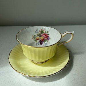 Vintage 1940s Paragon Pale Yellow with Interior Roses and Fruits Bone China Cup and Saucer