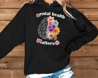 May include: Black hoodie with a graphic of a brain with flowers and the text "mental health matters" in pink.