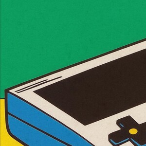May include: A vintage-style handheld video game console with a blue and white exterior. The console has a black screen and a directional pad with a yellow button.