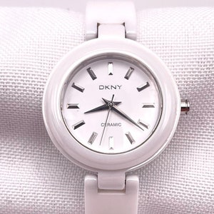Vintage Beautiful Ladies DKNY Wristwatch White Ceramic NY-8550 Quartz Screw Down Case Casual/Dress Watch New Battery