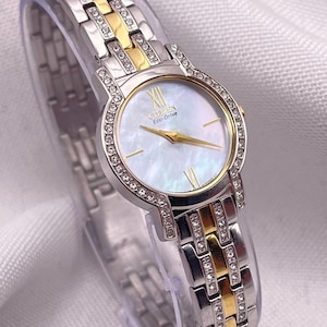Vintage 1990s CITIZEN Eco-Drive Mother of Pearl Dial Crystal Encrusted Bezel Crystal Silver/Gold Watch Bracelet Ladies Quartz Wristwatch