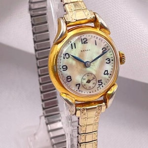 Vintage 1960s Swiss Made 15 Jewel Manual Wind Ladies Wristwatch Gold Round Case Mother of Pearl Dial, Subdial, Expandable Bracelet Strap