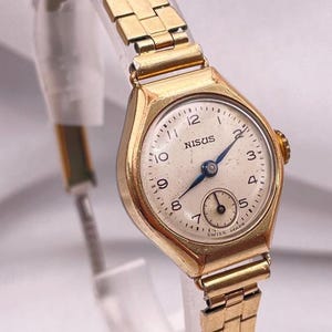 1950s Vintage Ladies Swiss Everyday Wear Manual Wind Watch 10 Kt Gold Filled Case 60 Seconds Subdial Classic Looking Bracelet Strap by NISUS