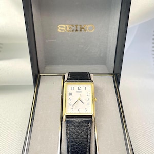 Vintage 1980's Unisex Seiko Quartz Tank Wristwatch Gold Plated Case with Leather Strap and New Battery with Original Box