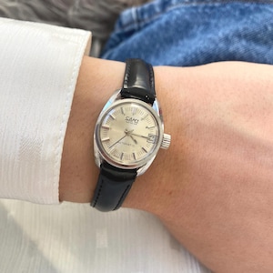 Classy Vintage 1960s Ladies Swiss CAMY &quot;Geneva&quot; Automatic Wristwatch Stainless Steel Case Round Silver Dial Date Window New Strap