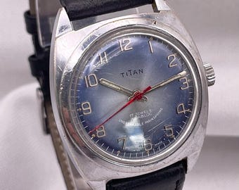 TITAN-unisekshorloge uit de jaren 70: 15 juwelen, handmatig opwindbaar, blauwe wijzerplaat, leren band, originele doos