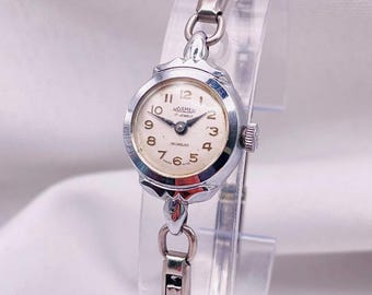 Vintage jaren 50 damescocktailhorloge: witgoudgevulde ronde kast en schakelarmband van Roamer