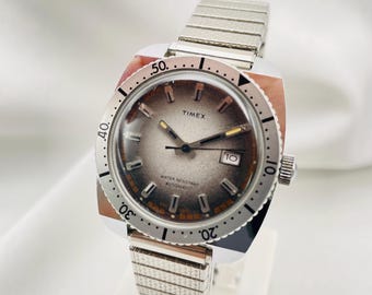 TIMEX Viscount automatisch duikhorloge uit de jaren 70, referentie: 47671-03275 Tweekleurige grijze wijzerplaat met datumvenster en zilveren kastpolshorloge