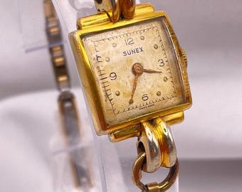 Vintage jaren 1940 dames art-deco polshorloge: sierlijke goudgevulde tankkast, 17 juwelen handmatig opwindbaar, vintage gouden kabelarmband van SUNEX