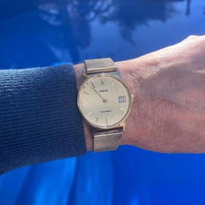 Vintage 1960s Swiss Made ENICAR &quot;Star Jewels&quot; Manual Wind Wristwatch Ref. 112/500 Gold Plated Round Dial with Gold Plated Mesh Watch Strap