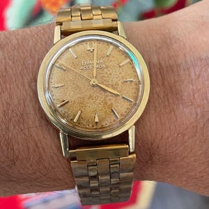 Bulova accutron 14 k gold case - Etsy 日本